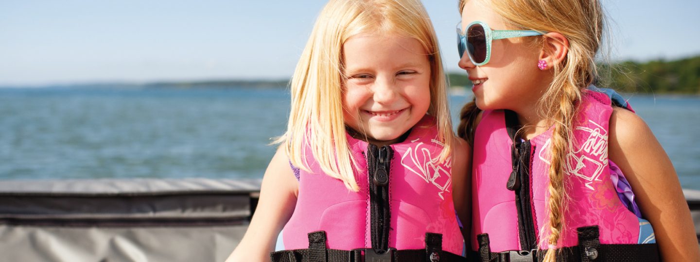 Little Girls sitting on boat