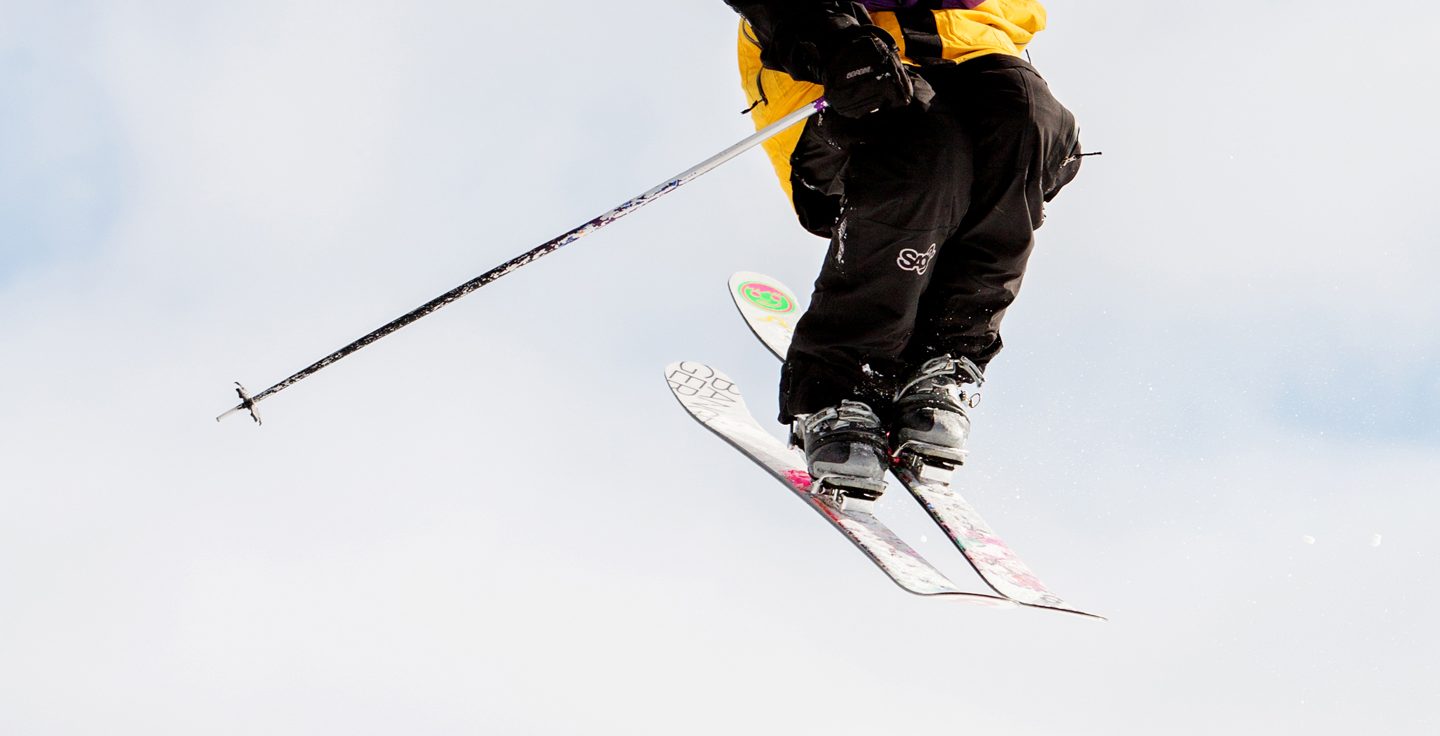 Skier in Purple Daze Terrain Park Midair