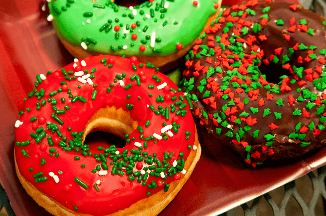 donuts with red and green holiday decorations