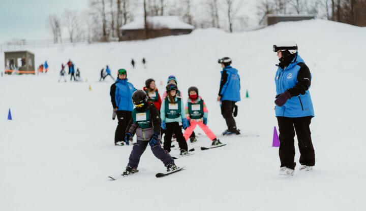 Shanty Creek Ski Instructors with Children's Group Lesson at the Magic Carpet