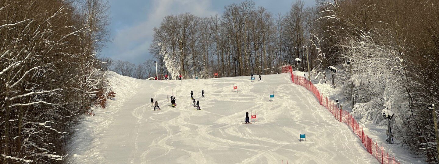 win-alpine-setting up race course on ski hill